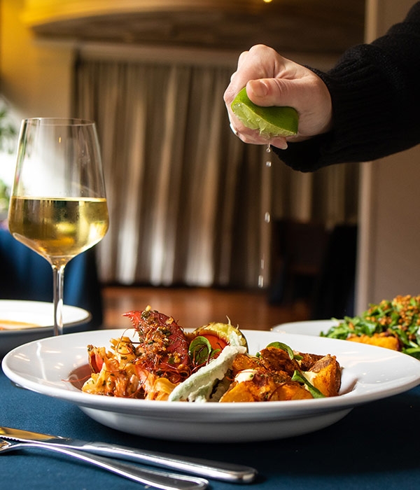 Seafood dish with wine